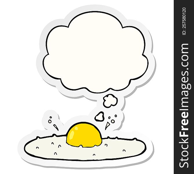 cartoon fried egg and thought bubble as a printed sticker