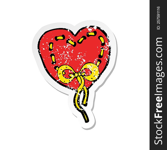 Retro Distressed Sticker Of A Stitched Heart Cartoon