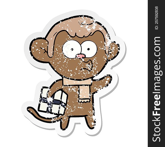 Distressed Sticker Of A Cartoon Christmas Monkey