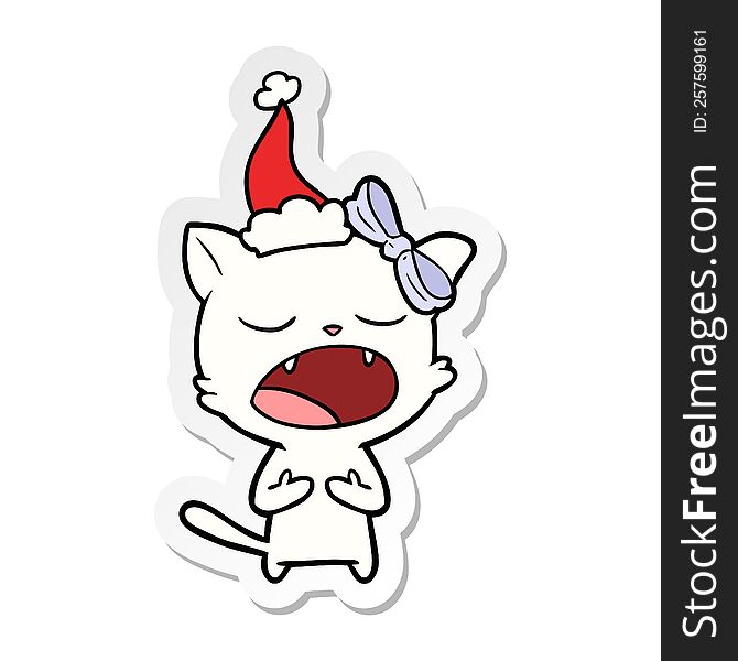 Sticker Cartoon Of A Cat Meowing Wearing Santa Hat