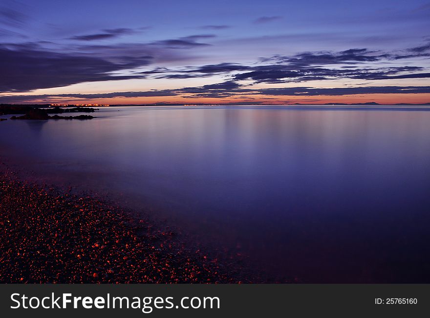 Seaside. Coast at night in Skerries, Ireland. Long exposure.