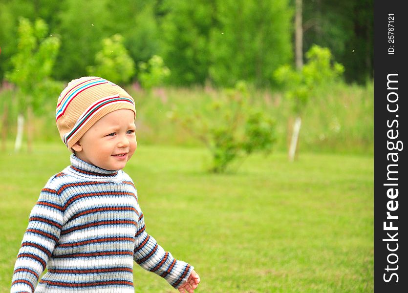 Happy child walking on a nature