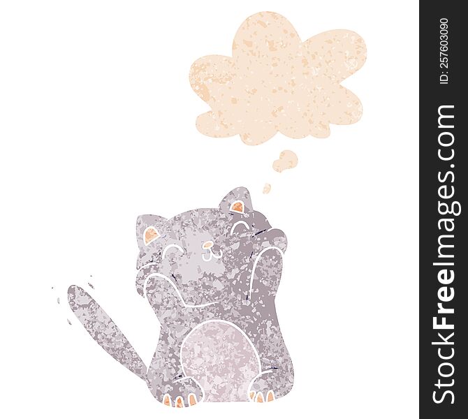 cartoon cat with thought bubble in grunge distressed retro textured style. cartoon cat with thought bubble in grunge distressed retro textured style