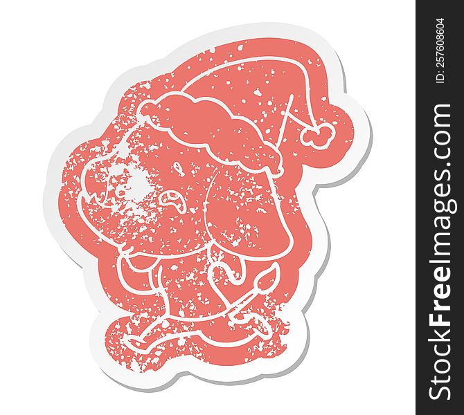 quirky cartoon distressed sticker of a elephant remembering wearing santa hat