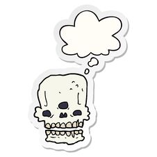 Cartoon Spooky Skull And Thought Bubble As A Printed Sticker Royalty Free Stock Photos