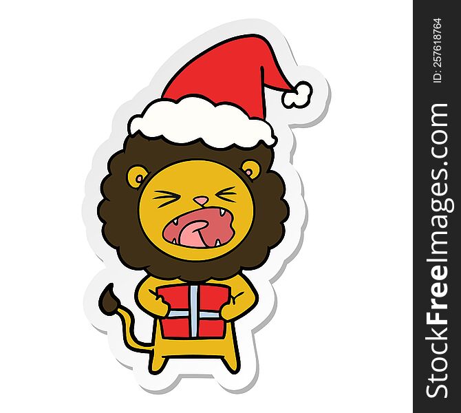 hand drawn sticker cartoon of a lion with christmas present wearing santa hat