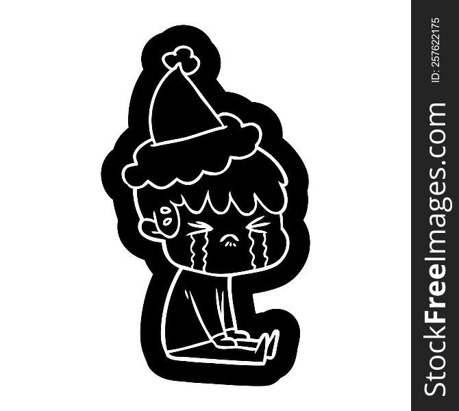 quirky cartoon icon of a boy crying wearing santa hat