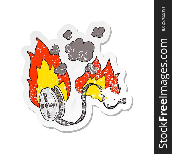 retro distressed sticker of a cartoon movie film burning