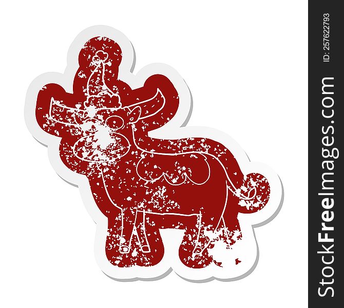 quirky cartoon distressed sticker of a bull wearing santa hat