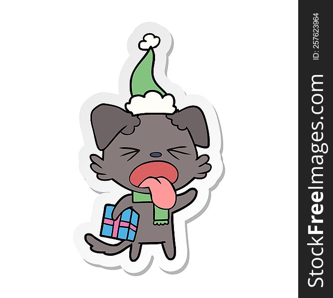 hand drawn sticker cartoon of a disgusted dog with christmas gift wearing santa hat