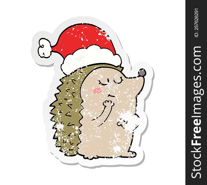distressed sticker of a cartoon hedgehog wearing christmas hat