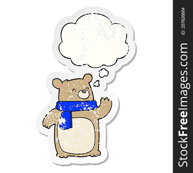 cartoon bear wearing scarf with thought bubble as a distressed worn sticker