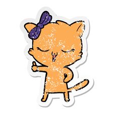 Distressed Sticker Of A Cartoon Cat With Bow On Head Stock Image