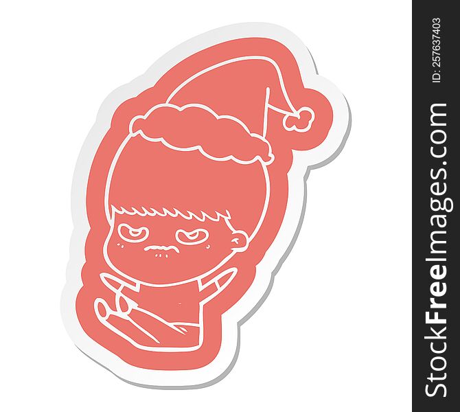 quirky cartoon  sticker of a boy wearing santa hat