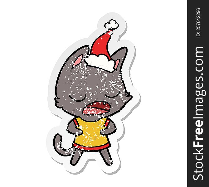 Talking Cat Distressed Sticker Cartoon Of A Wearing Santa Hat
