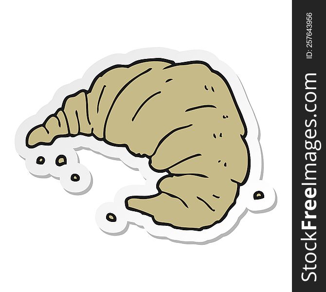 sticker of a cartoon croissant