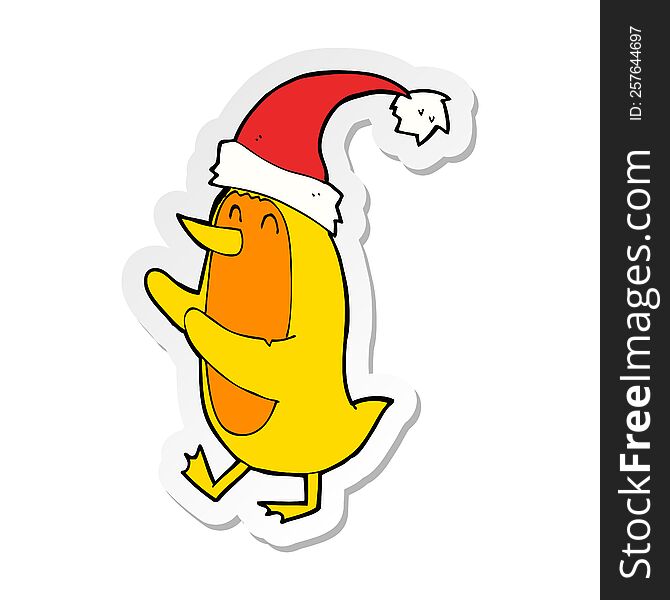 sticker of a cartoon bird wearing xmas hat