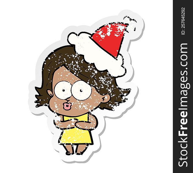 hand drawn distressed sticker cartoon of a girl pouting wearing santa hat