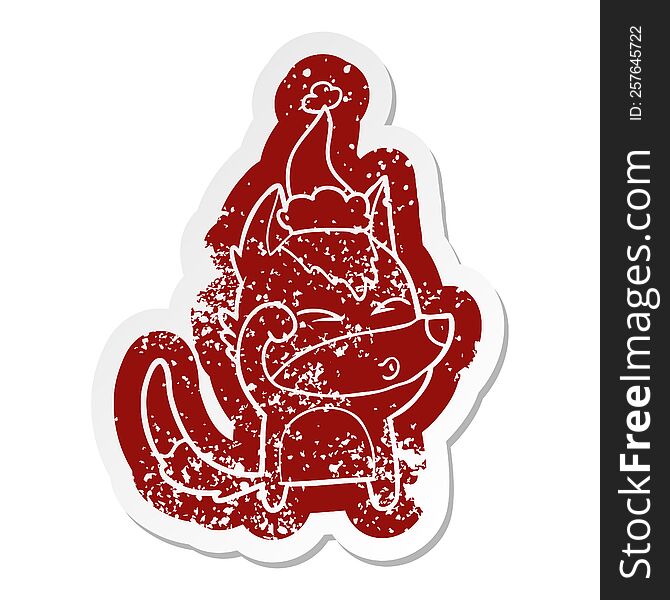 Cartoon Distressed Sticker Of A Wolf Pouting Wearing Santa Hat