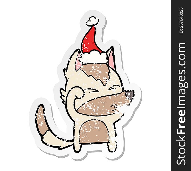 Distressed Sticker Cartoon Of A Wolf Pouting Wearing Santa Hat