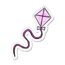 Sticker Of A Cartoon Flying Kite Royalty Free Stock Photos
