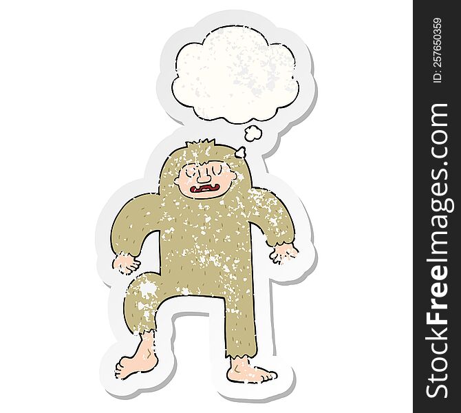 cartoon bigfoot with thought bubble as a distressed worn sticker