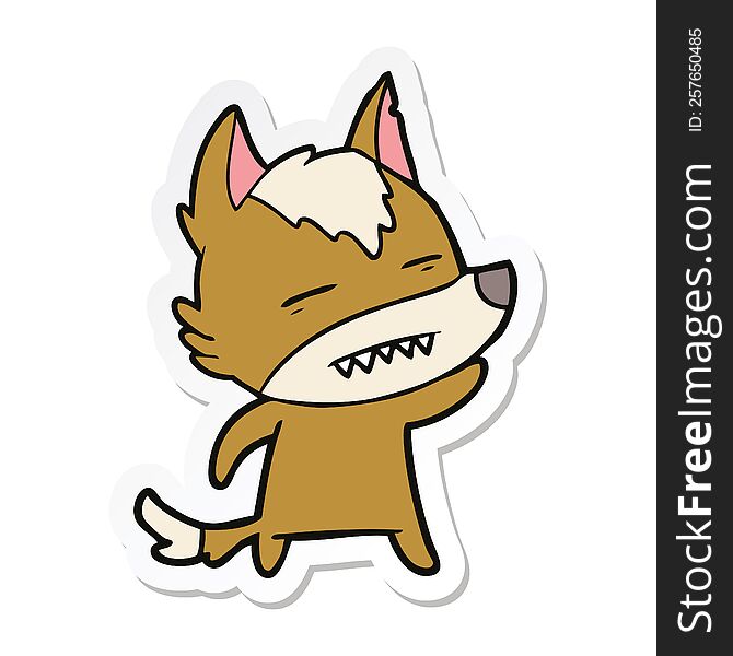 sticker of a cartoon wolf waving showing teeth