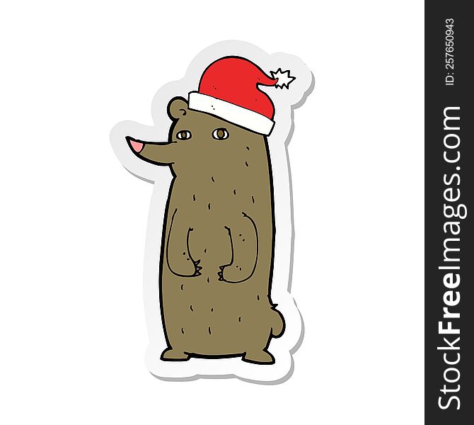 sticker of a cartoon bear in xmas hat