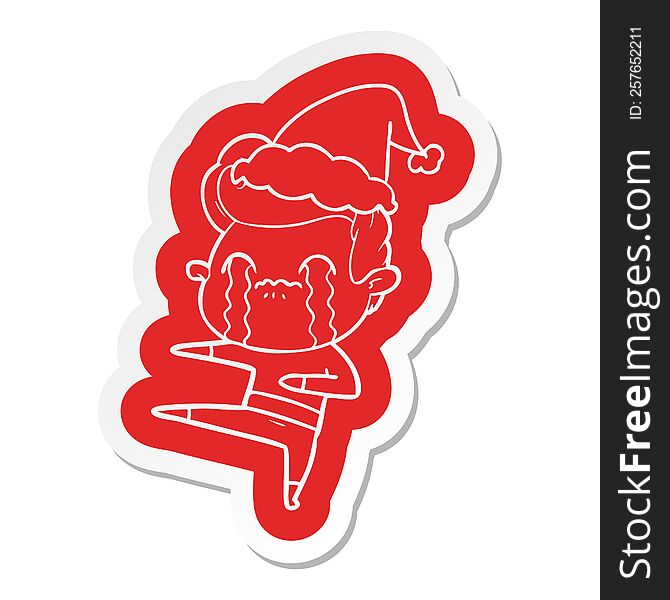 quirky cartoon  sticker of a man crying wearing santa hat