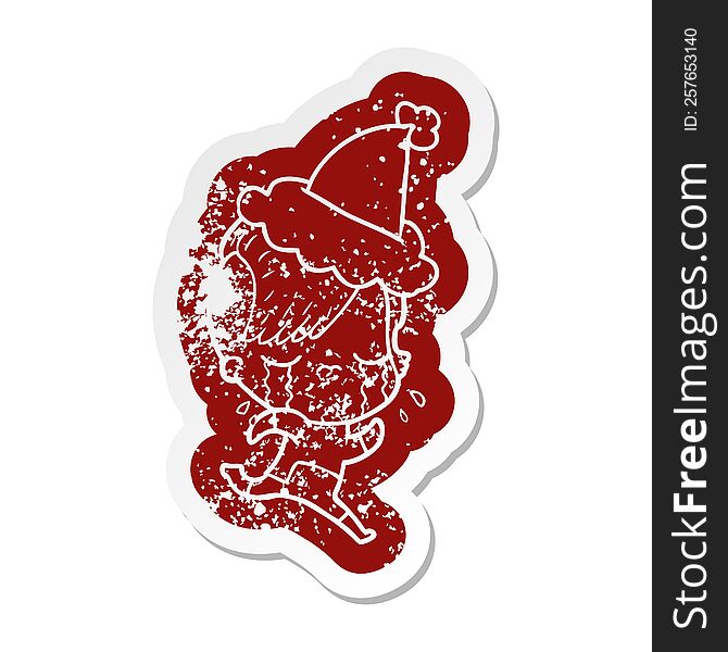 quirky cartoon distressed sticker of a crying girl wearing space clothes wearing santa hat