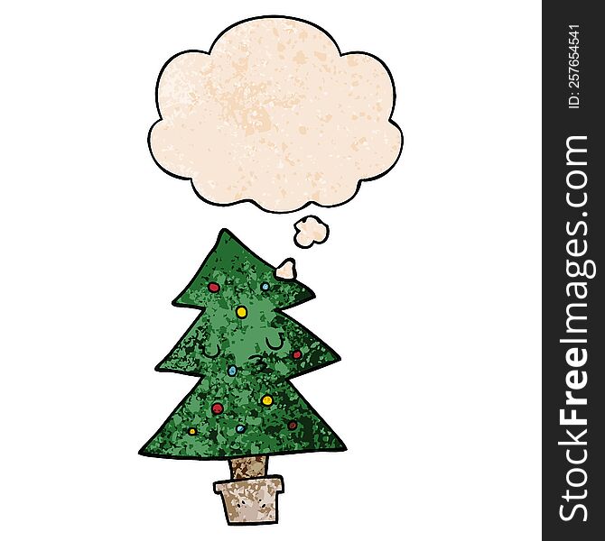 cartoon christmas tree with thought bubble in grunge texture style. cartoon christmas tree with thought bubble in grunge texture style