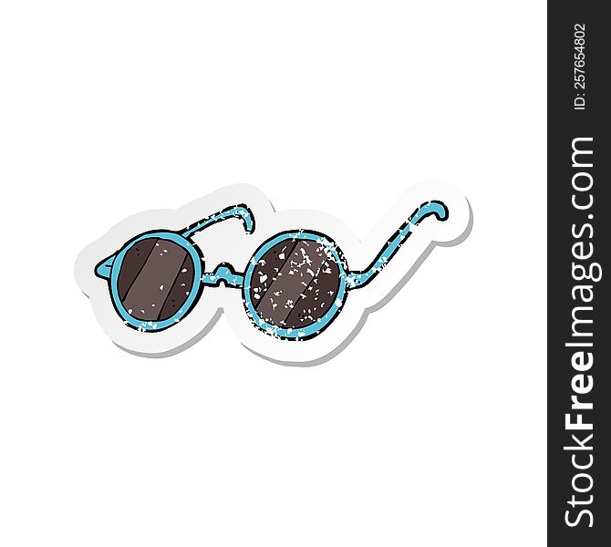 Retro Distressed Sticker Of A Cartoon Sunglasses