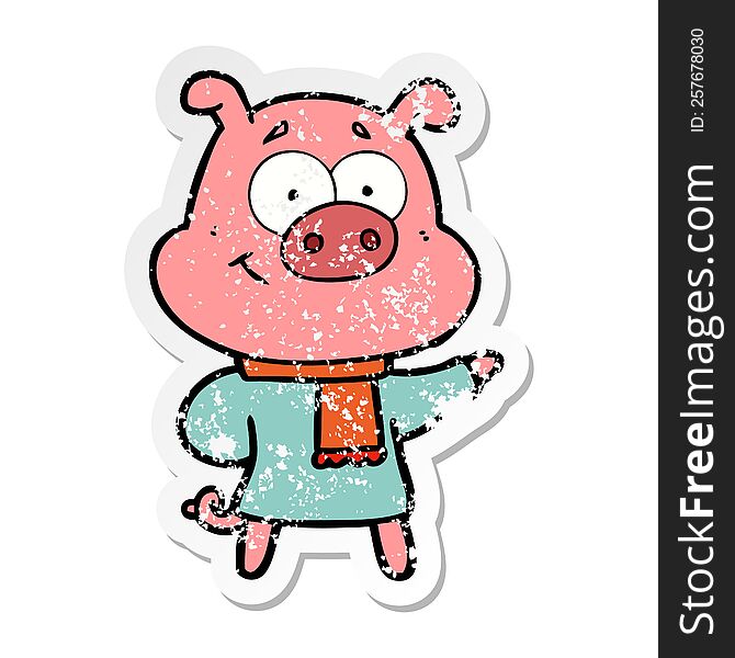 distressed sticker of a happy cartoon pig wearing warm clothes