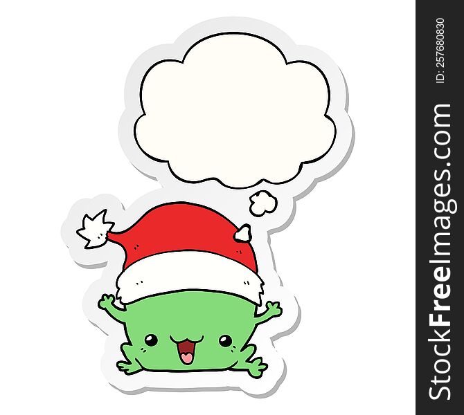 cute cartoon christmas frog with thought bubble as a printed sticker