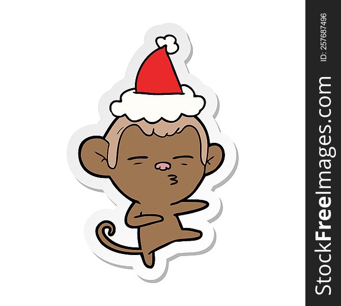 hand drawn sticker cartoon of a suspicious monkey wearing santa hat
