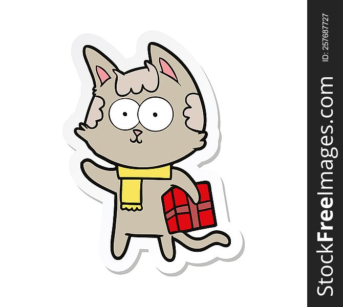 sticker of a happy cartoon cat with christmas present