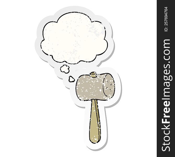cartoon mallet with thought bubble as a distressed worn sticker