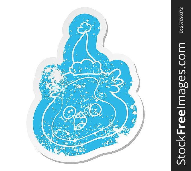 quirky cartoon distressed sticker of a germ wearing santa hat