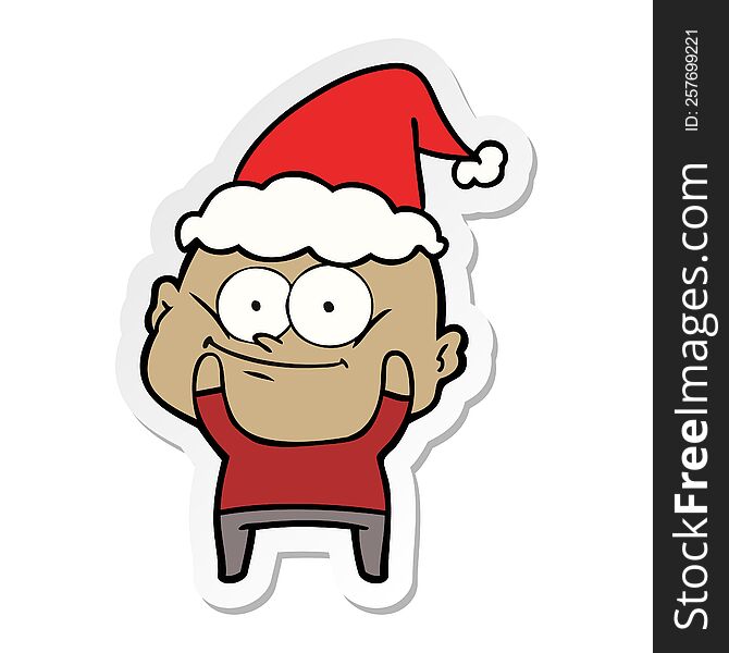 hand drawn sticker cartoon of a bald man staring wearing santa hat