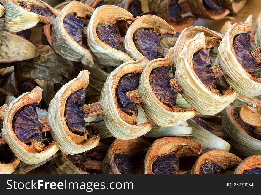 Sliced sun-dried Betel Nuts (Areca nut) for chewing, popular in Asia. Sliced sun-dried Betel Nuts (Areca nut) for chewing, popular in Asia