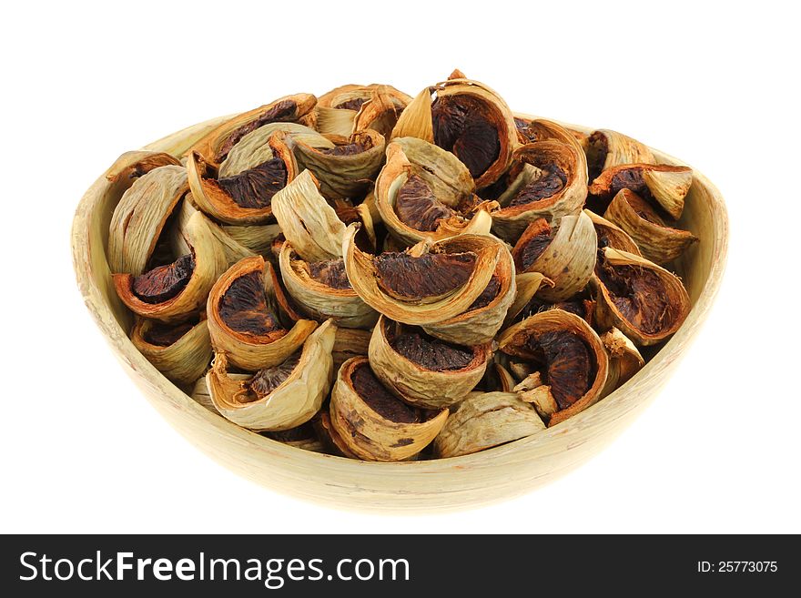 Sliced sun-dried Betel Nuts (Areca nut) for chewing, popular in Asia, isolated on white background. Sliced sun-dried Betel Nuts (Areca nut) for chewing, popular in Asia, isolated on white background