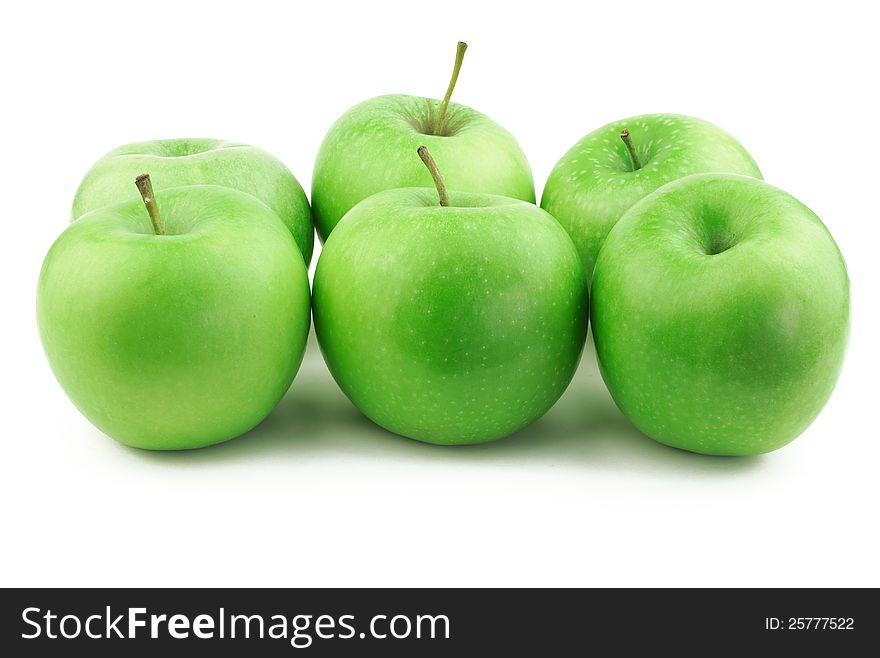 Lots of green apples on white background