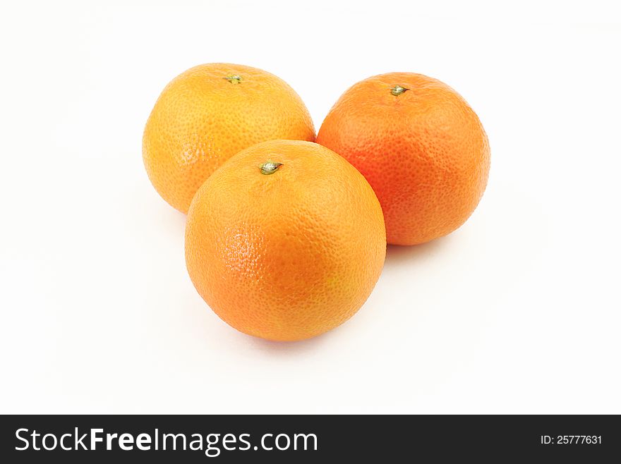 Three mandarins on white background