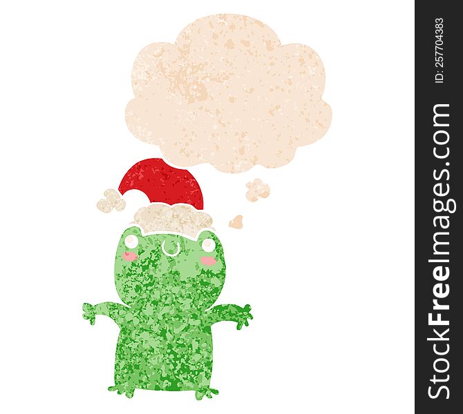 cute cartoon frog wearing christmas hat with thought bubble in grunge distressed retro textured style. cute cartoon frog wearing christmas hat with thought bubble in grunge distressed retro textured style