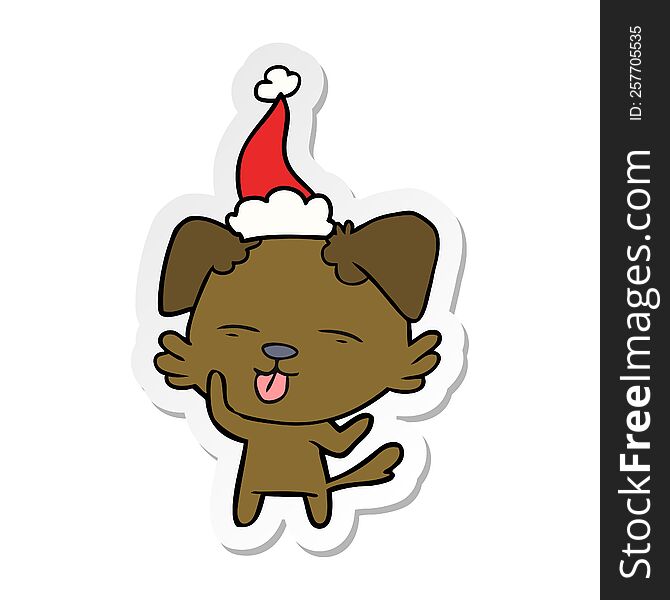 hand drawn sticker cartoon of a dog sticking out tongue wearing santa hat