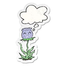 Cartoon Thistle And Thought Bubble As A Distressed Worn Sticker Royalty Free Stock Photos