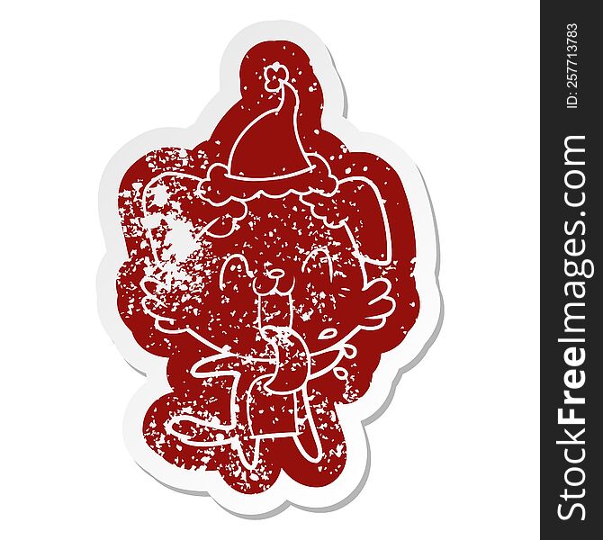 Cartoon Distressed Sticker Of A Panting Dog Wearing Santa Hat