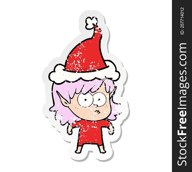 hand drawn distressed sticker cartoon of a elf girl staring wearing santa hat