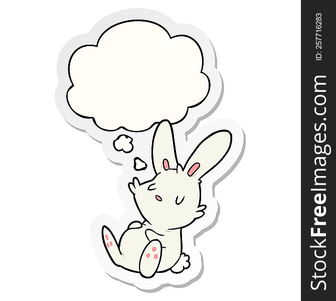 cartoon rabbit sleeping with thought bubble as a printed sticker