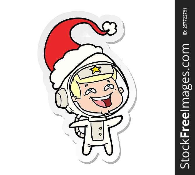 Sticker Cartoon Of A Laughing Astronaut Wearing Santa Hat